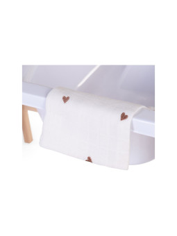 Nursery furniture for babies and children with changing table and white and natural wood baby bath by Childhome