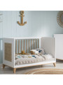 Nami Evolutive Bed 60x120 in White Wood & Natural Rattan  - Théo Bébé