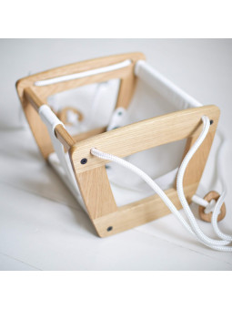 Swing for children aged 3 months to 3 years in oak and real black or white leather - comfortable seat made by hand